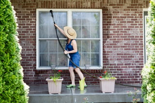 bigstock-Housewife-Washing-The-Windows--90077612.jpg