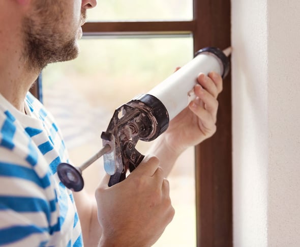 bigstock-Man-with-caulking-gun-63177598sm.jpg