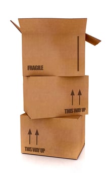cardboard boxes in high detail - isolated over a white background.jpeg